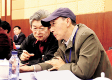 杨力舟委员与韩书力委员交流提案