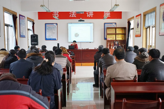 中国文艺网-中国煤矿文联书法志愿者走进新矿